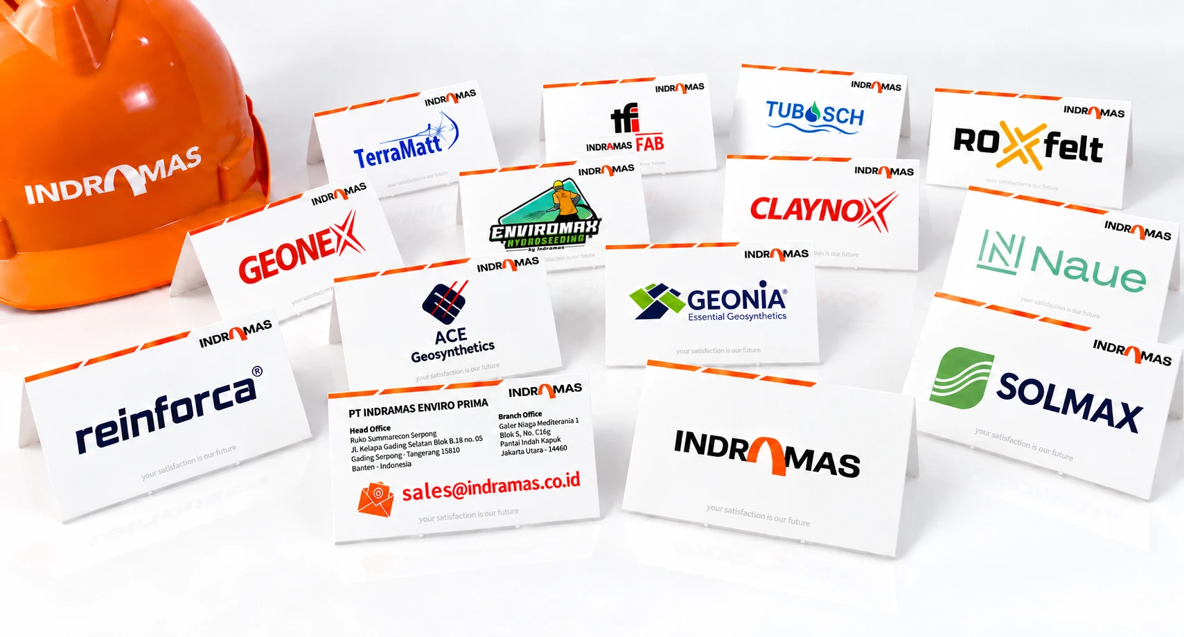 Table cards with the logos of Indramas' brand partners: Solmax, Naue, Tubosch, Roxfelt, Claynox, Reinforca, EnviroMax, Geonex, ACE Geosynthetics, Geonia, TerraMatt and Indramas FAB